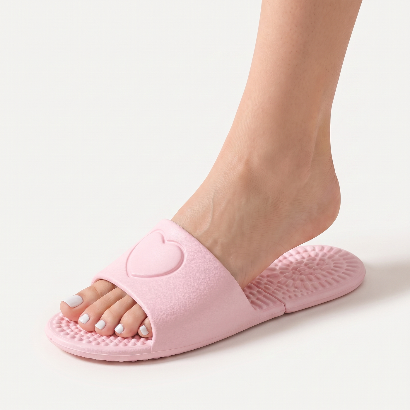 Pocket Slippers in pink worn on a foot