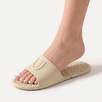 Pocket Slippers in khaki worn on a foot