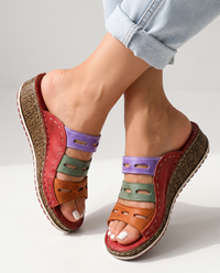 Sunslides Red sandals worn on feet