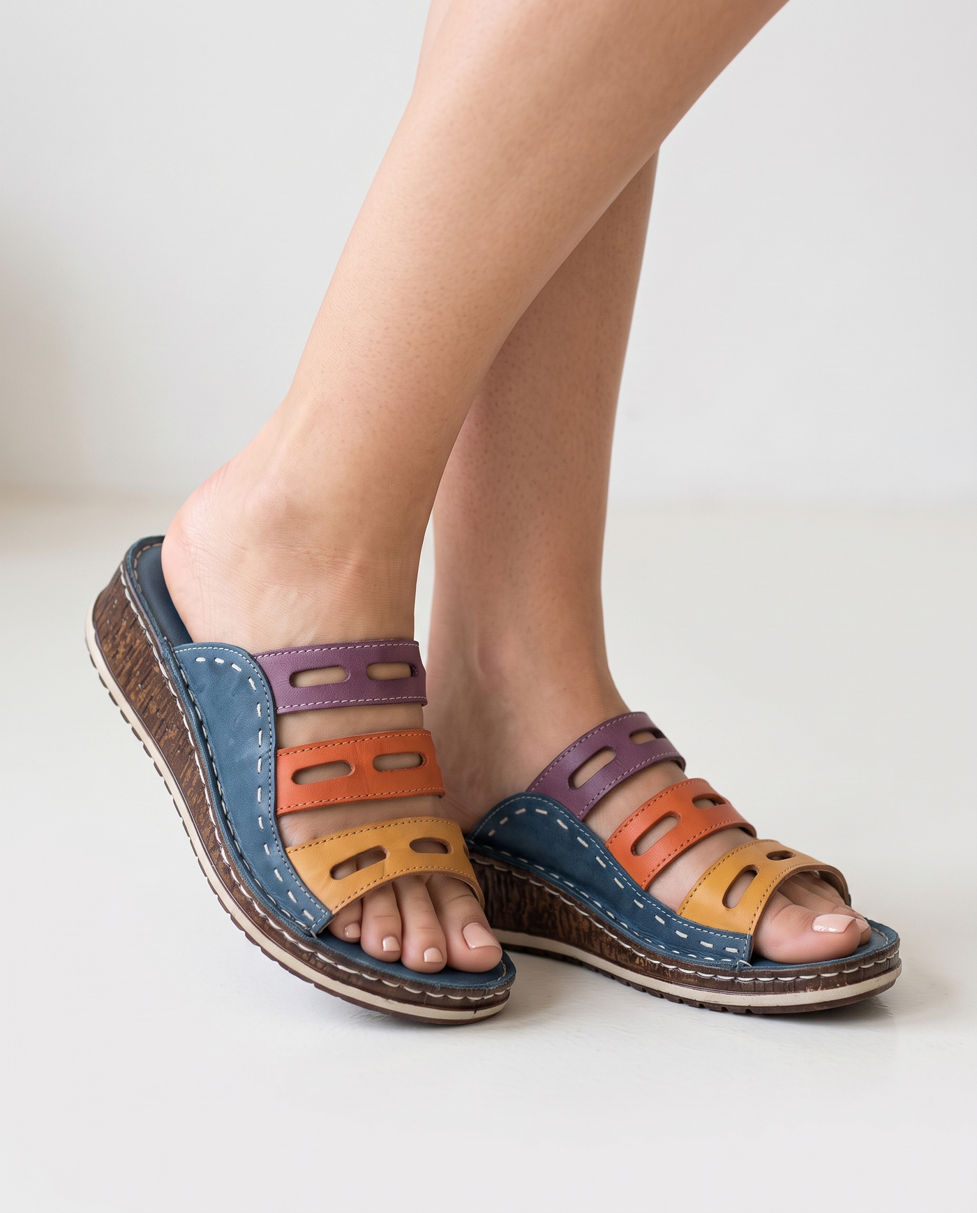 Sunslides Dark Blue sandals worn on feet