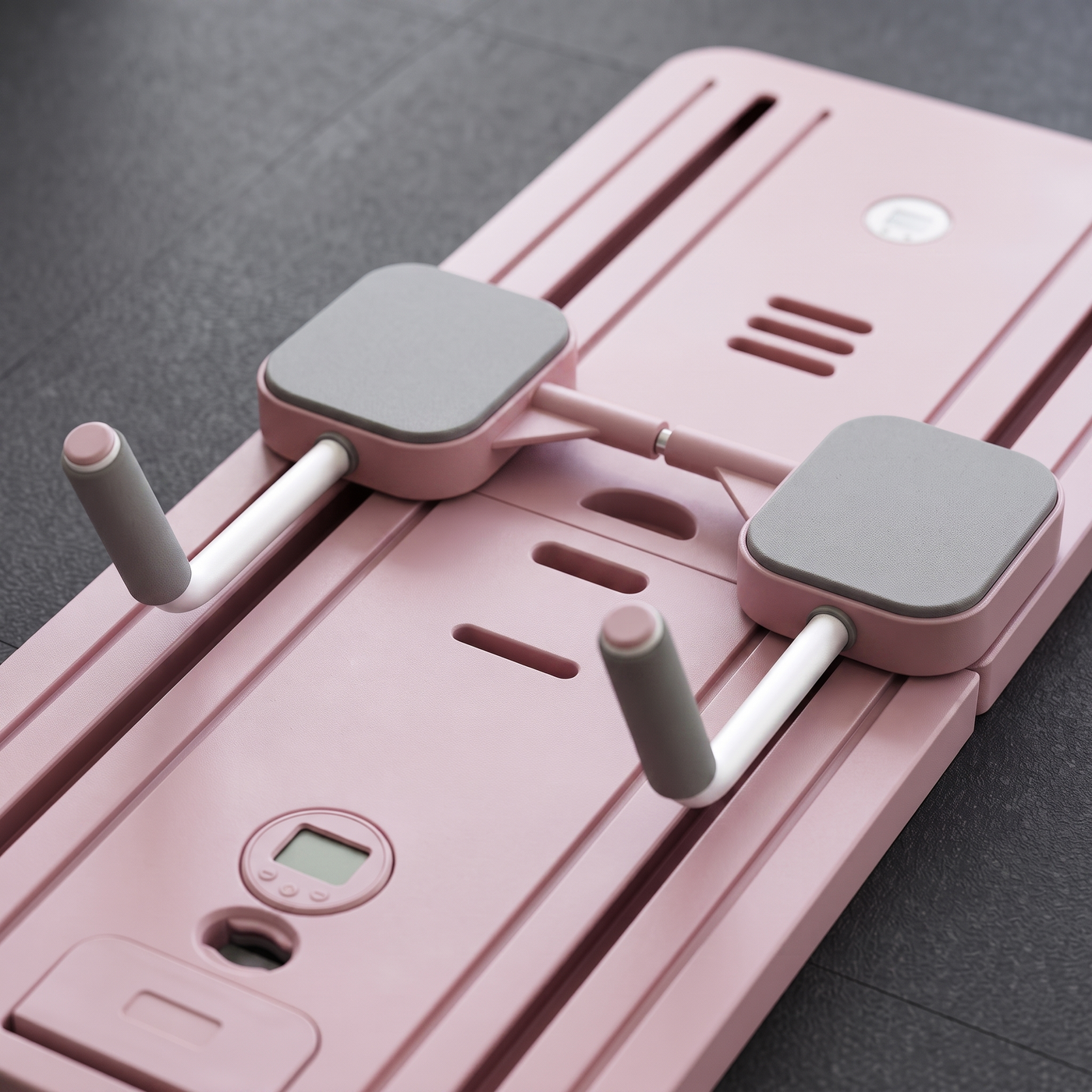 Close up of the sliding pads on the pink board